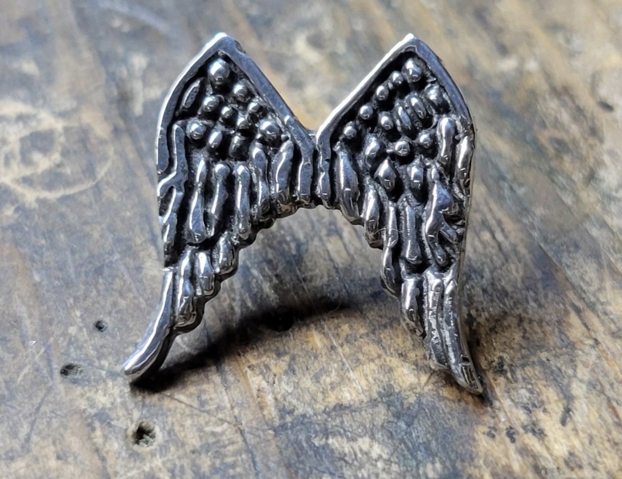 Sterling silver angel wings pendant with detailed feather texture
